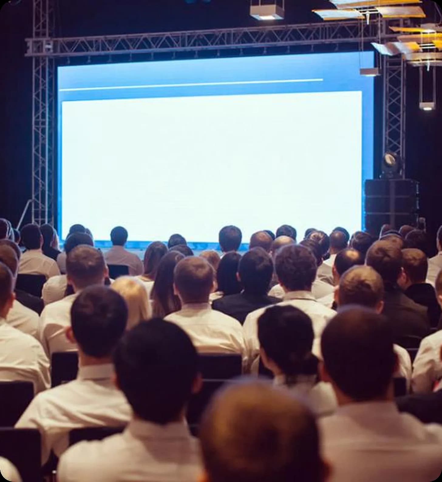Corporate delegates and audience attending an international business conference event